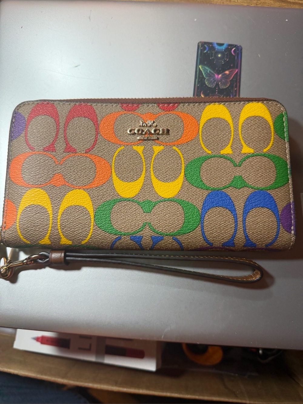 Coach Signature Zip Wristlet in Rainbow Coach Logo on Brown